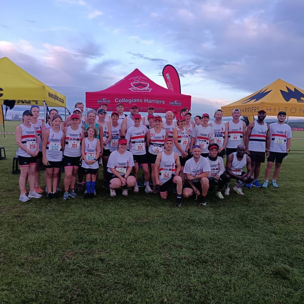 Collegians Harriers members gathered together at a race